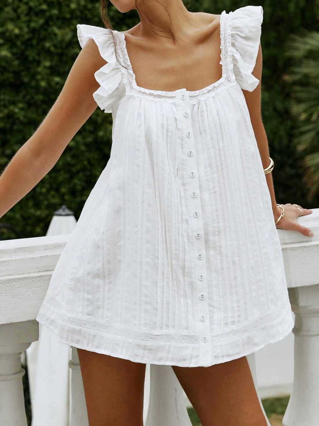 Step into the spotlight with this playful Y2K mini dress that screams vintage charm! Featuring a sleek solid-color cami silhouette, delicate lace patchwork details, and flirty ruffle trim, this dress is your go-to for summer parties and festival season. The mix of textures creates an effortlessly cool vibe that channels early 2000s nostalgia while feeling fresh and modern. Perfect for dancing the night away or making a statement at any gathering. Slip it on and let your style do the talking!