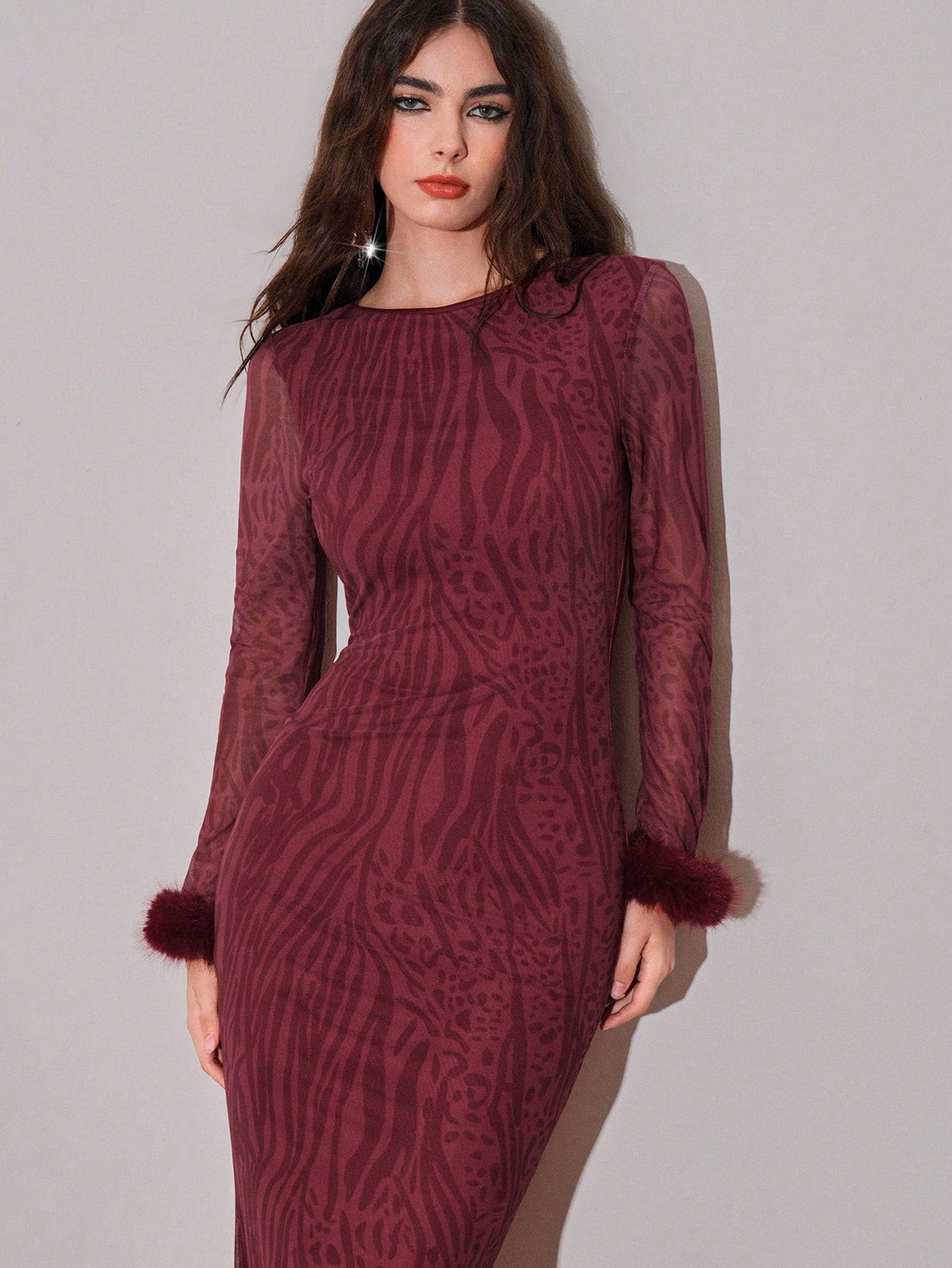 Make a bold statement with this eye-catching zebra print dress that brings wild style to your everyday wardrobe. The playful black and white stripes pair perfectly with fun fringe detailing that adds movement and personality to every step. Designed with a comfortable round neckline and relaxed raglan sleeves, this dress flatters all body types while keeping you cool and confident. Whether you're heading to brunch with friends or turning heads at a night out, this trendy piece proves that animal print never 
