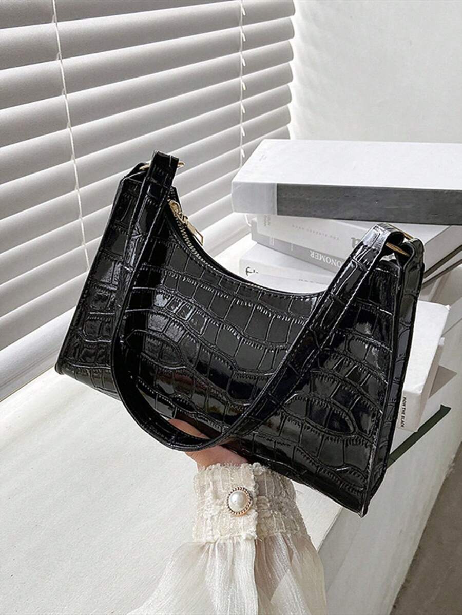 Step out in style with this Trendy Zebra Print Shoulder Bag, crafted from high-quality PU leather that’s both durable and chic. The bold zebra and subtle leopard accents add a fun twist to your everyday look, while the perfect underarm size keeps your essentials close and hands-free. Whether for brunch or a night out, this playful purse is your new favorite companion for effortless style and convenience.