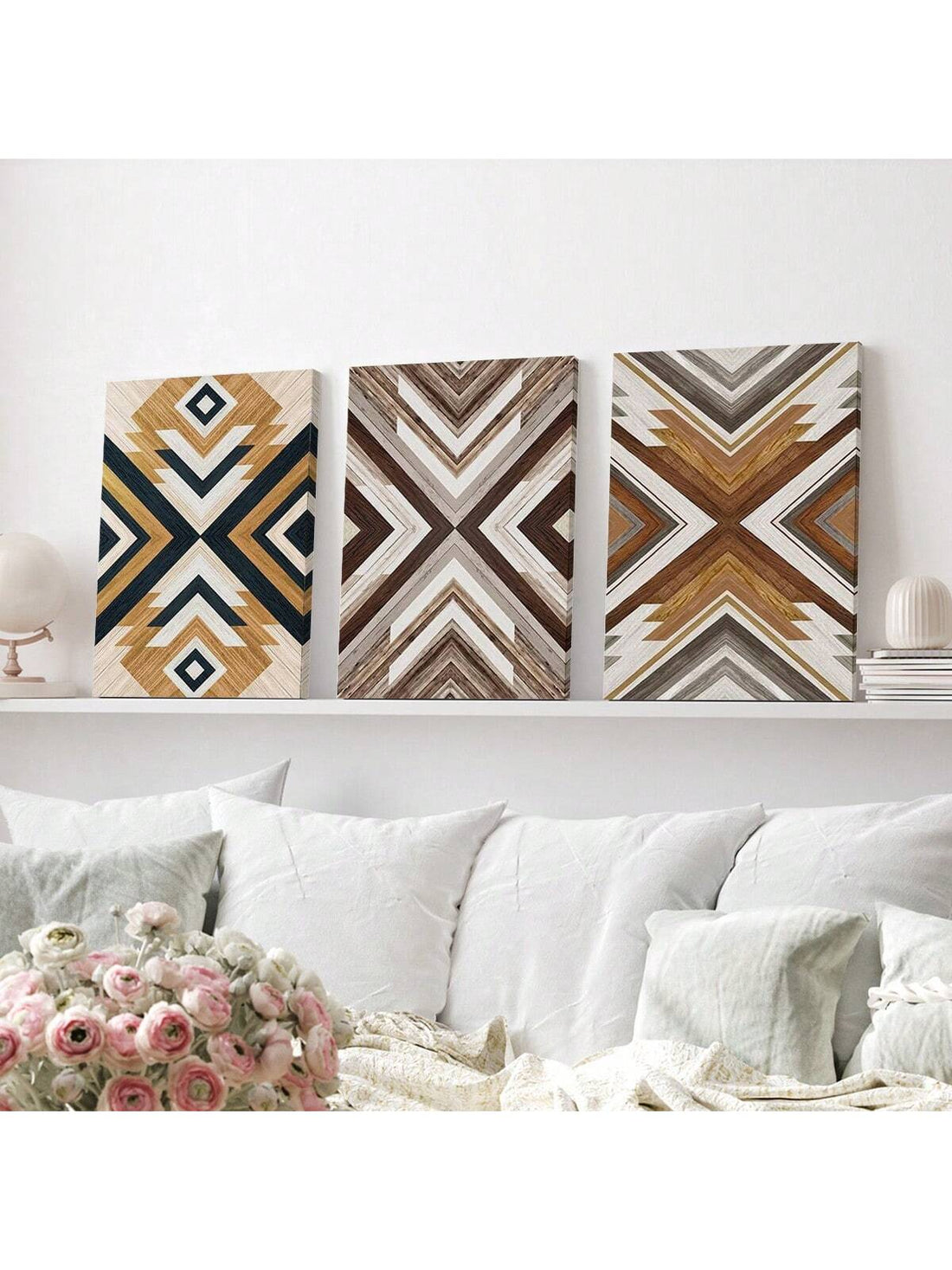 Introduce a touch of tribal elegance to your space with this 3-piece Aztec canvas wall art set. Perfect for boho-inspired spaces, this set features intricate tribal designs on canvas that will add character and style to any room. Elevate your interior with this unique and eye-catching wall art set.