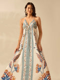 Embrace the tropical vibes in our Boho Bliss maxi dress. Featuring a lace-up design and spaghetti straps, this dress is perfect for a laid-back look. Experience the bliss of comfort and style with a touch of bohemian flair.