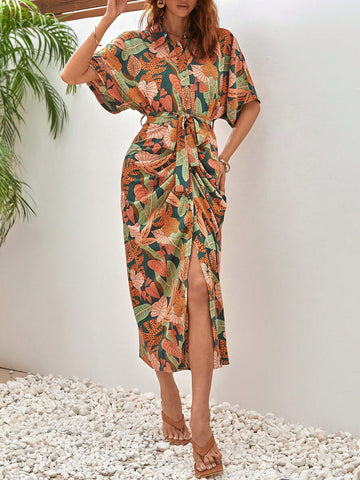 Get ready to turn heads in our Tropical Elegance dress! Featuring a chic batwing sleeve design and figure-flattering ruching and belted waist, this dress will elevate your style with a touch of tropical charm. Perfect for any occasion, this playful dress will have you feeling elegant and effortlessly stylish.
