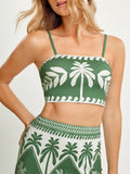Transport yourself to paradise with this vibrant green leaf print two-piece set designed for the modern traveler. Featuring a relaxed fit and breathable fabric, this ensemble effortlessly transitions from poolside lounging to casual beachside dinners. The coordinated top and bottom create an instantly put-together look without the fuss, making it your go-to choice for tropical getaways and warm-weather adventures. Perfect for anyone who wants to embrace that carefree resort vibe, whether you're actually vac