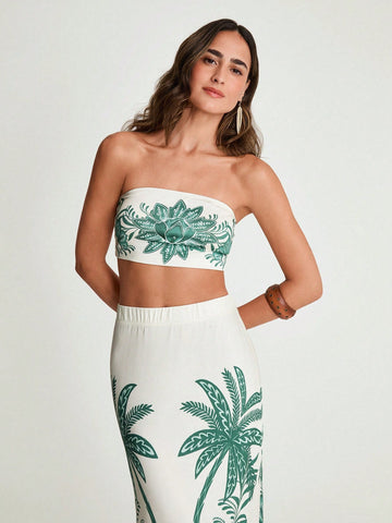 Escape to paradise in this vibrant tropical two-piece set that screams vacation vibes. The strapless tube top hugs your curves while the elasticized maxi skirt flows effortlessly, giving you that breezy, carefree beach look. Perfect for sandy shores, poolside lounging, or sunset strolls—this set combines comfort with undeniable style. Whether you're sipping cocktails by the ocean or exploring a tropical destination, you'll feel confident and fabulous. Pack it, wear it, love it!