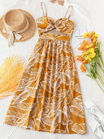 Sway into summer with this eye-catching tropical leaf print dress! The vibrant yellow fabric and flirty spaghetti straps create an instant vacation vibe, while the twist front detail adds a touch of sophistication. Perfect for beach days, island getaways, or simply bringing sunshine to your everyday wardrobe. This breezy number will have you feeling fabulous with minimal effort!