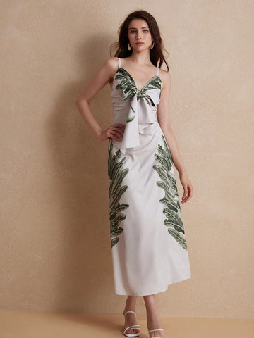 Experience the ultimate tropical paradise with our Beach Vacation Dress! Featuring bowknot shoulder straps, this dress will not only keep you stylish, but also comfortable during your beach getaway. Made from high-quality materials, it's the perfect addition to your vacation wardrobe.