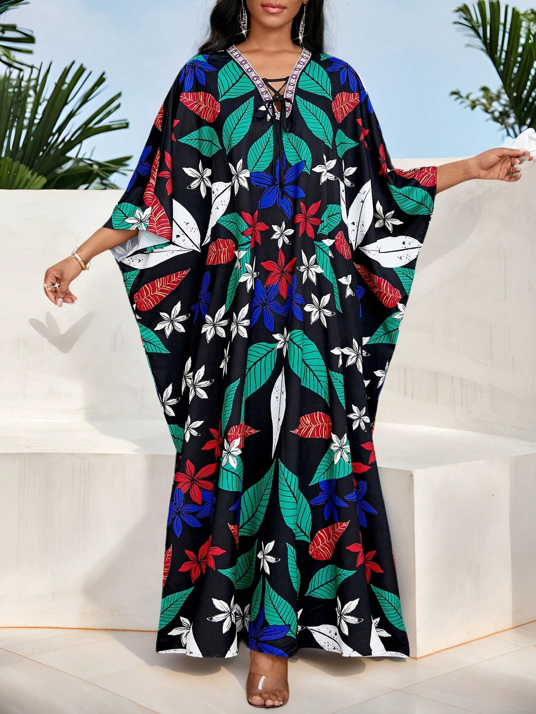 Introducing our Tropical Plant Print Tie-Waist Batwing Long Casual Dress for Women, the perfect holiday style! With its playful batwing design, vibrant tropical print, and flattering tie-waist, this dress will have you feeling fun and fabulous all vacation long. Say aloha to your new favorite dress!