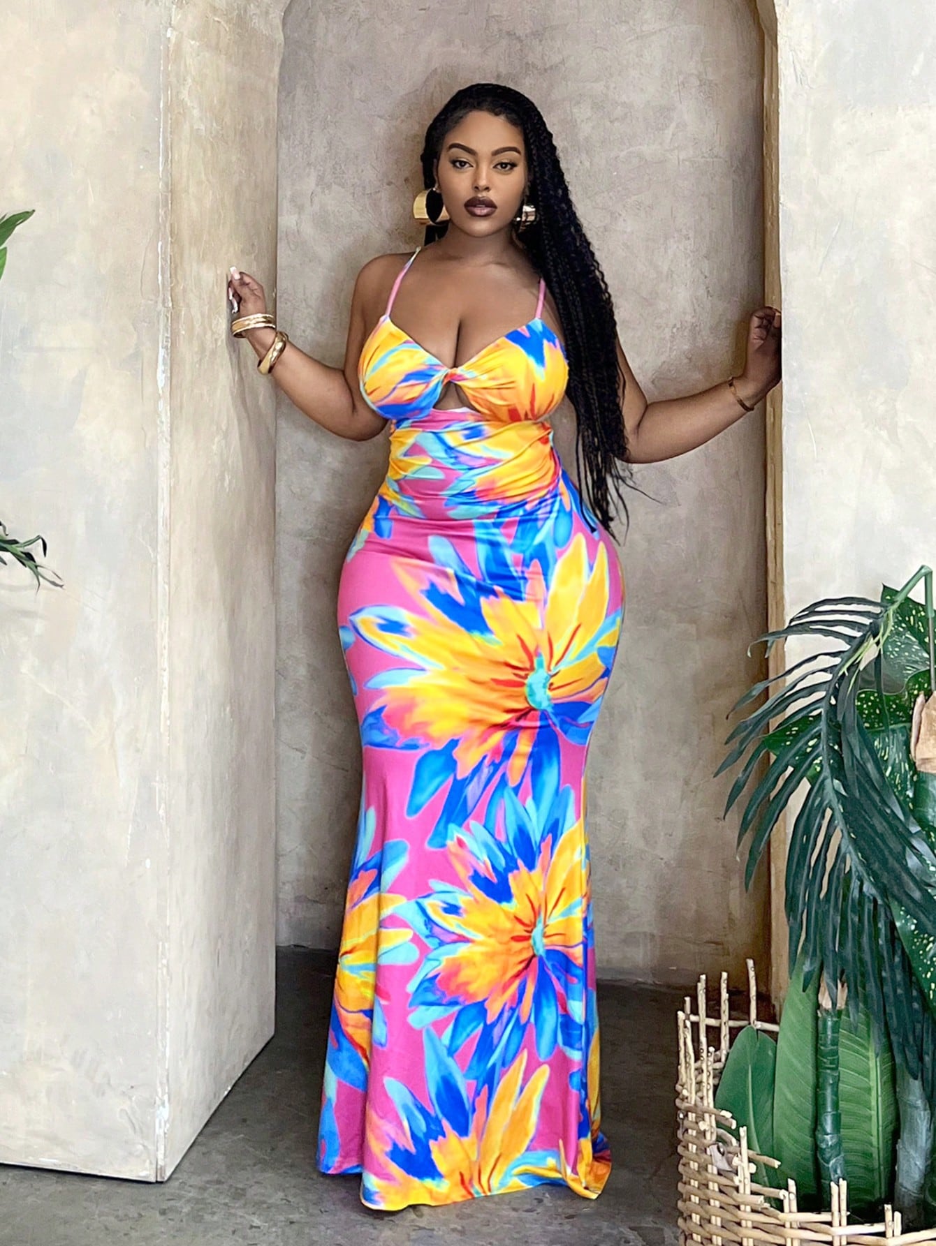 Escape to paradise in this show-stopping tropical dress! Designed for curves and confidence, this fitted number features a chic twist front detail that flatters your silhouette while the dramatic fish tail hem adds a flirty, fashion-forward finish. Perfect for beach getaways, resort dinners, or anywhere you want to turn heads this summer. The vibrant tropical print brings instant vacation vibes, whether you're sipping cocktails poolside or exploring island adventures. Comfortable, stylish, and unapologetica