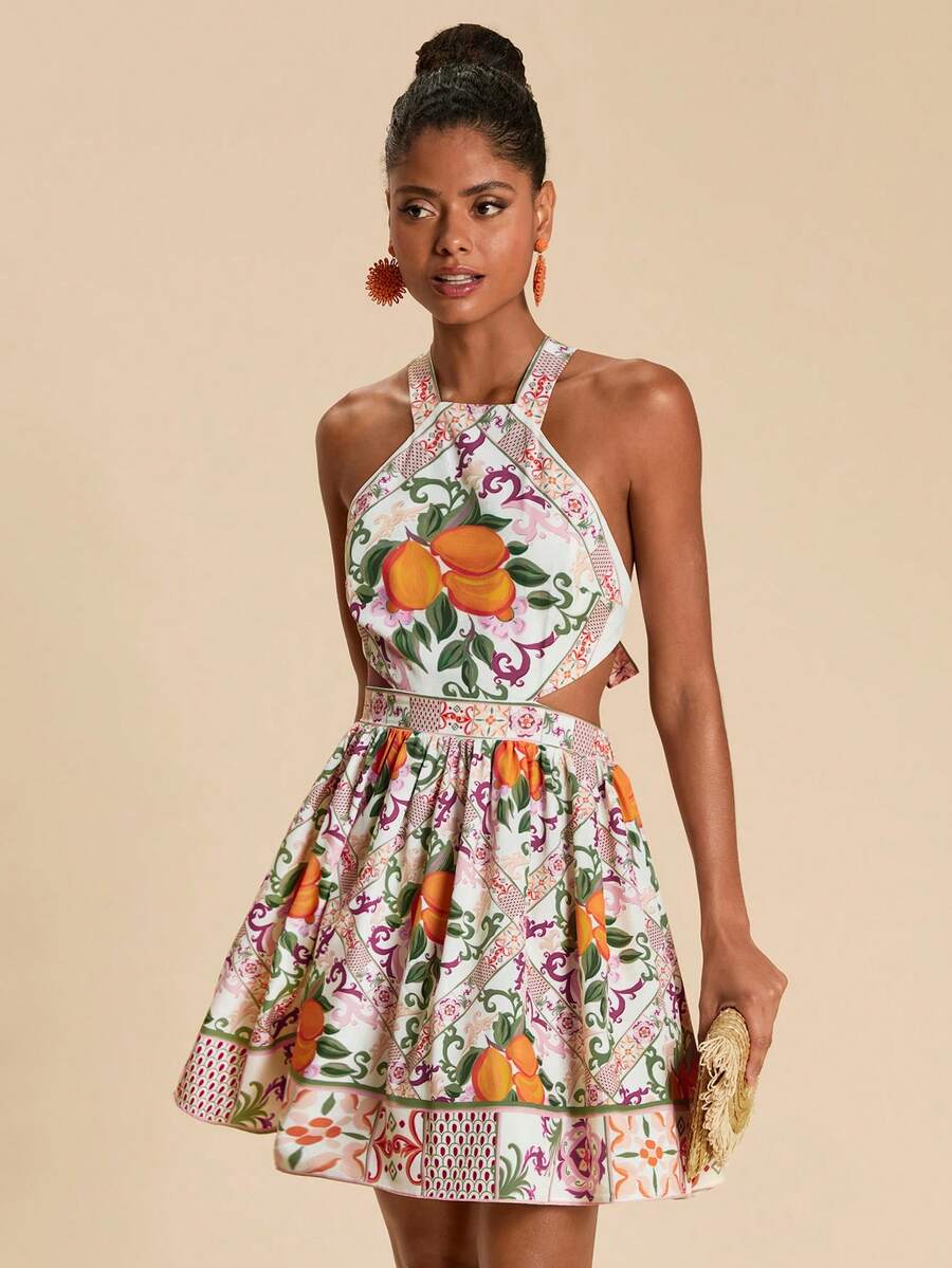 Escape to paradise in this vibrant tropical print vacation dress. Designed for effortless elegance, this sleeveless halter style features a flattering high-waist A-line silhouette with layered tiered hemming that moves beautifully. The boho-inspired design showcases lush fruit and plant patterns in multicolor tones, perfect for beach days, resort getaways, and warm-weather celebrations.