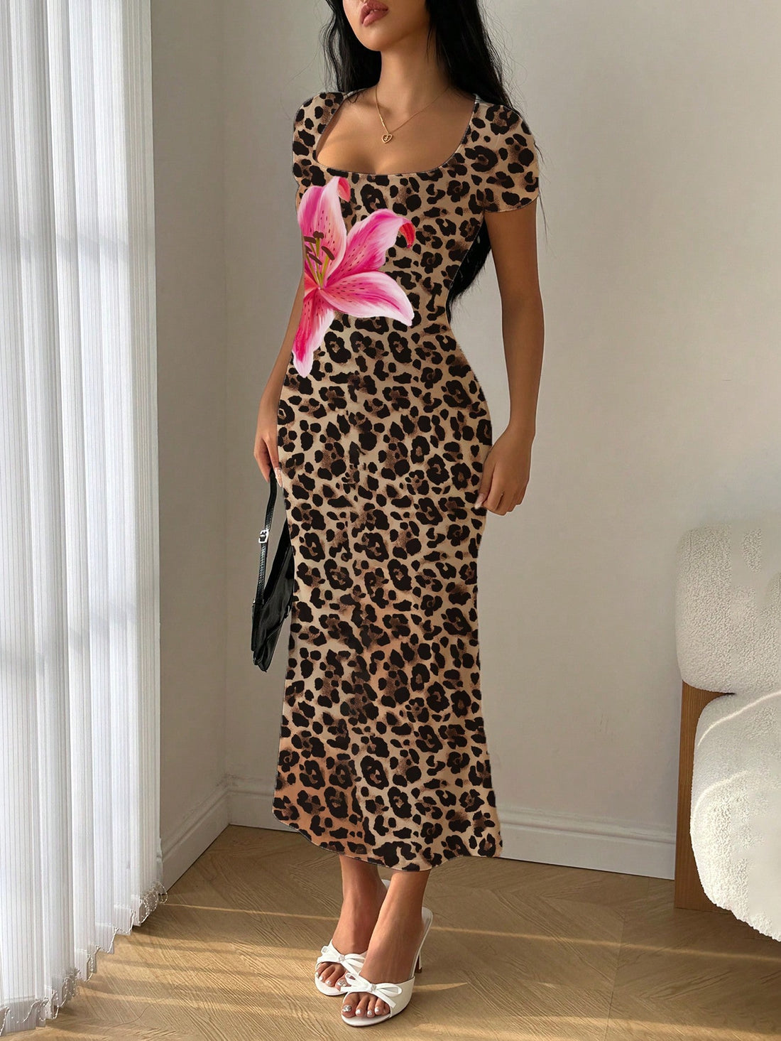Get ready to unleash your wild side with the Untamed Beauty Leopard Bloom Scoop Neck Bodycon Dress. With its fierce leopard print and mermaid ruffle details, this dress will bring out your inner goddess. Show off your curves and turn heads in this playful and seductive dress. Rawr!