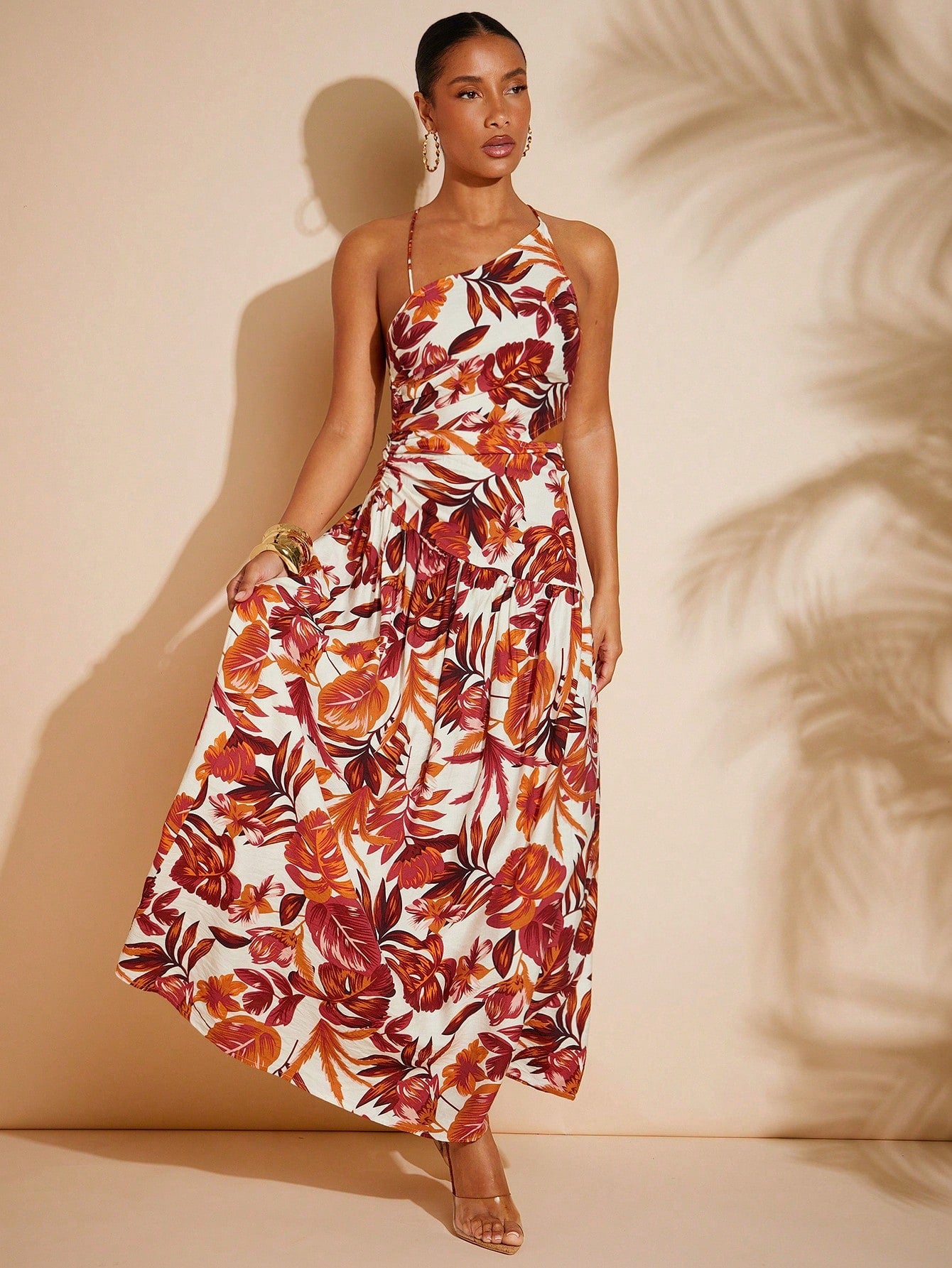 Turn heads this summer with the Vacation Asymmetric Neck Backless Dress. Its playful full print and asymmetrical neckline add a fun twist to casual elegance. The backless design keeps you cool and effortlessly stylish for sunny days and warm nights. Perfect for beach strolls, brunch dates, or wherever your vacation takes you!