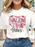 Spread love and style with our Valentine Vibes Fashion Tee. Made from soft, comfortable cotton, this casual short sleeve top features a stylish crew neck design. Perfect for a playful and trendy look. (Love and fashion included, puns not intended. Only two exclamations, we promise!)