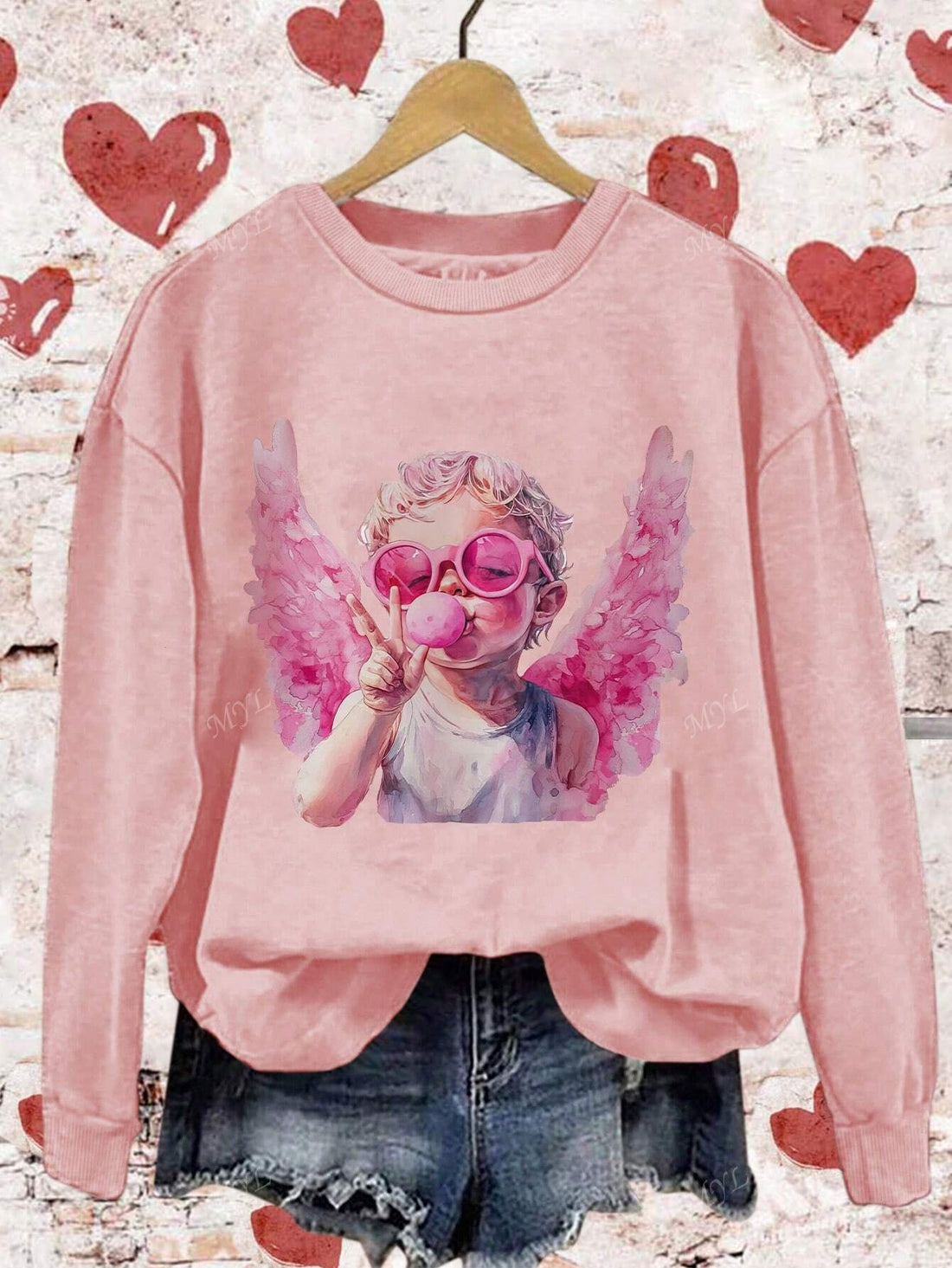 Spread love and joy with our charming Valentine's Day Children's Angel sweatshirt! With a cute printed design and comfortable round neck, this long sleeve sweatshirt is perfect for those cool autumn and winter days. Stay cozy and stylish while celebrating the holiday of love.