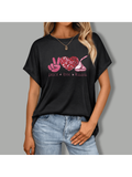 Spread the love with our Valentine's Day Peace & Love Heart Graphic Tee! This sweet and stylish shirt is perfect for any occasion, bringing peace and love wherever you go. Show off your playful side and make a statement with our quirky design.