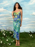 Step into the sunshine with this playful Van Gogh Iris-inspired summer dress. Featuring an elegant halter neck and a backless swing design, it offers a breezy, flattering fit perfect for warm days. The blue and green oil painting pattern captures vibrant artistry, while side slits add a flirty flair to every step. Embrace artful style and effortless comfort wherever your summer adventures take you.