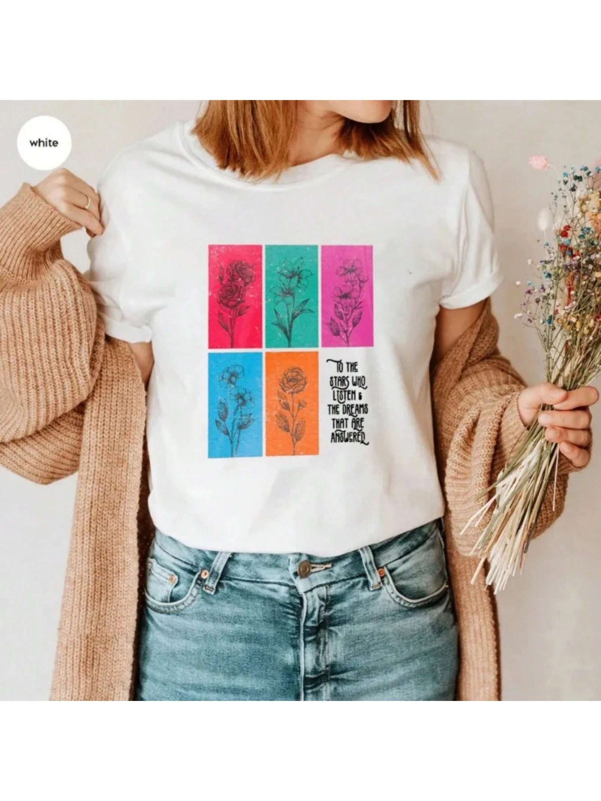 Unleash your inner bookworm with the Velaris Dreams: ACOTAR Quote Cotton T-Shirt! Made from soft cotton and featuring a quote from SJM's popular series, this licensed merch is a must-have for any fan. Perfect for casual wear or to show off your love for the series at book club meetings. (Warning: wearing this shirt may result in other readers starting conversations with you, bonding over your shared love for the books.)