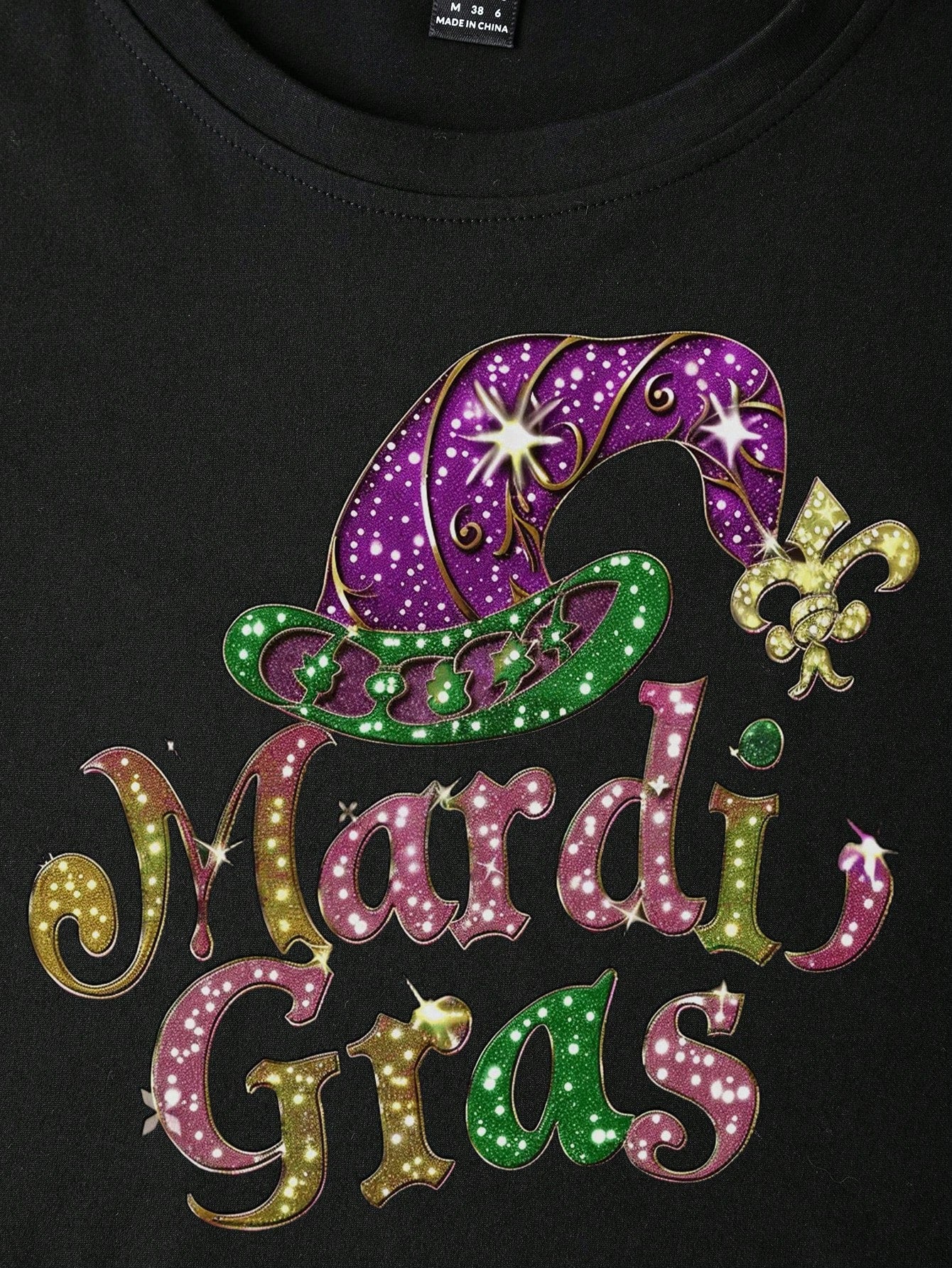 Unleash your playful side with the versatile Carnival Graphic Tee. This comfortable short sleeve crew neck is perfect for everyday style, adding a touch of fun and quirkiness to any outfit. Embrace the carnival vibes and stand out from the crowd with this must-have piece.