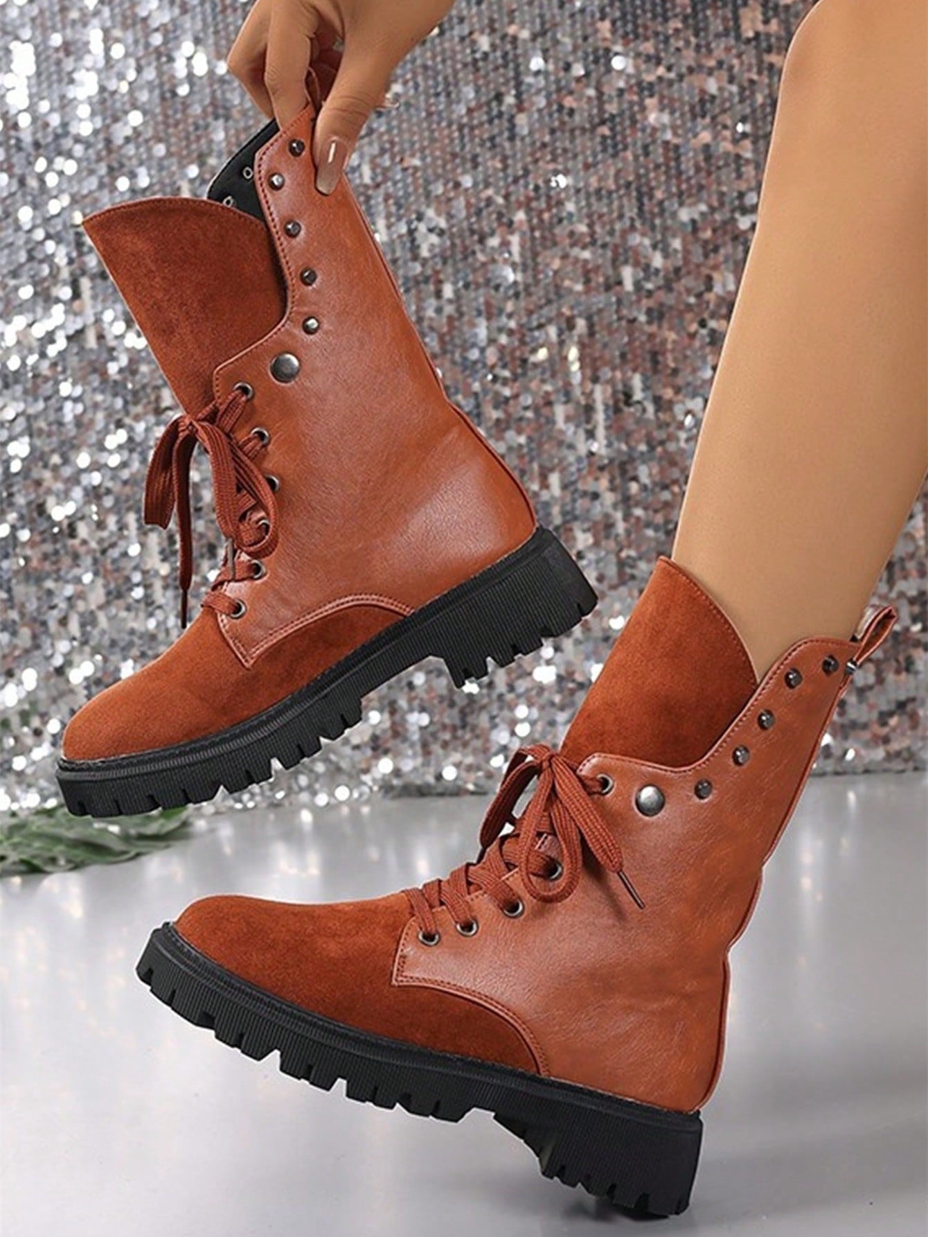 Elevate your fashion game with our Versatile Lace-Up Mid-Calf Boots. These boots offer a stylish and versatile option for any outfit. Featuring a comfortable lace-up design, you can step up your style with ease. Perfect for any occasion, these boots are a must-have for any fashion-forward individual.