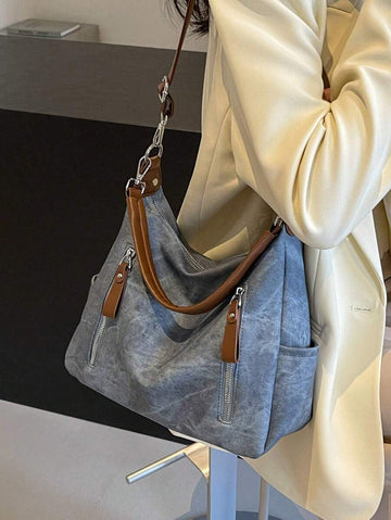 This roomy shoulder bag combines style and function with its trendy denim-like fabric and spacious interior. Perfect for carrying all your essentials and more, it features a detachable strap for versatile wear—switch from shoulder to crossbody in a snap. Whether you're out shopping or meeting friends, this playful bag adds a fun, casual vibe to any outfit.