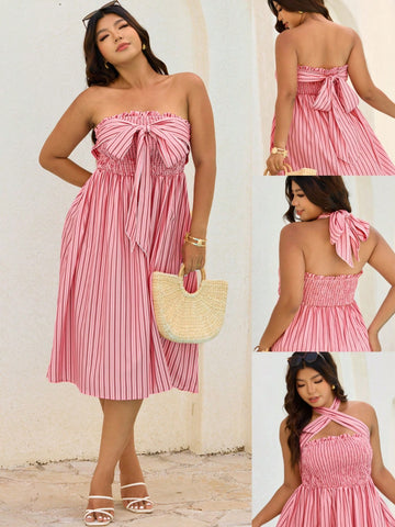 Get ready to turn heads with this Versatile Plus Size Strapless Cross Neck Holiday Dress! The playful striped pattern adds a splash of fun, while the cross neck design keeps things chic and modern. Perfect for any festive occasion, this dress combines comfort and style effortlessly, making it your go-to for holiday celebrations. Dance, laugh, and sparkle in a look that's as lively as you are!