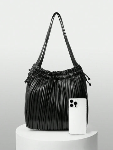 Add a splash of fun to your outfit with this versatile solid color pleated drawstring shoulder bag. Its playful pleats and easy drawstring closure keep your essentials secure while adding a chic twist to your look. Perfect for fashionistas who love style and convenience in one delightful package!