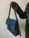 This Versatile Tassel Shoulder Bag is a must-have accessory for any woman's wardrobe. With its retro design and tassel detail, it adds a touch of elegance to any outfit. Its versatile nature allows it to be used for any occasion, making it the perfect essential for every woman.
