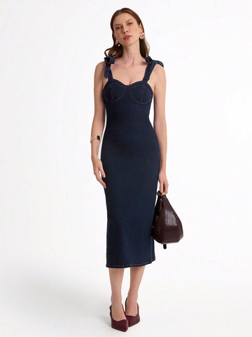 This playful denim dress is your new go-to for effortless style. With a fitted silhouette and adjustable straps, it offers a perfect fit that moves with you. Whether you're dressing it up or keeping it casual, this versatile piece adds a fun, flirty touch to any outfit.