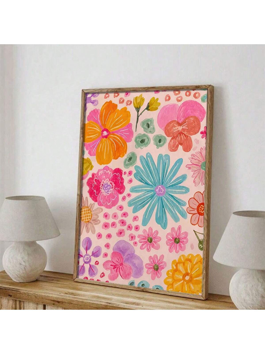 Add a pop of vibrancy to your home decor with our Vibrant Abstract Floral Canvas Poster. Made with high-quality, unframed canvas, this wall art will bring life to any room. Elevate your style with this stylish and playful piece. Hang it up and watch your walls bloom!