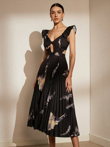 Expertly crafted for your next vacation, the Vibrant Floral Cutout Dress boasts stunning floral patterns and delicate cutouts for a touch of elegance. Stay cool and stylish in this must-have dress, perfect for any warm-weather adventure.