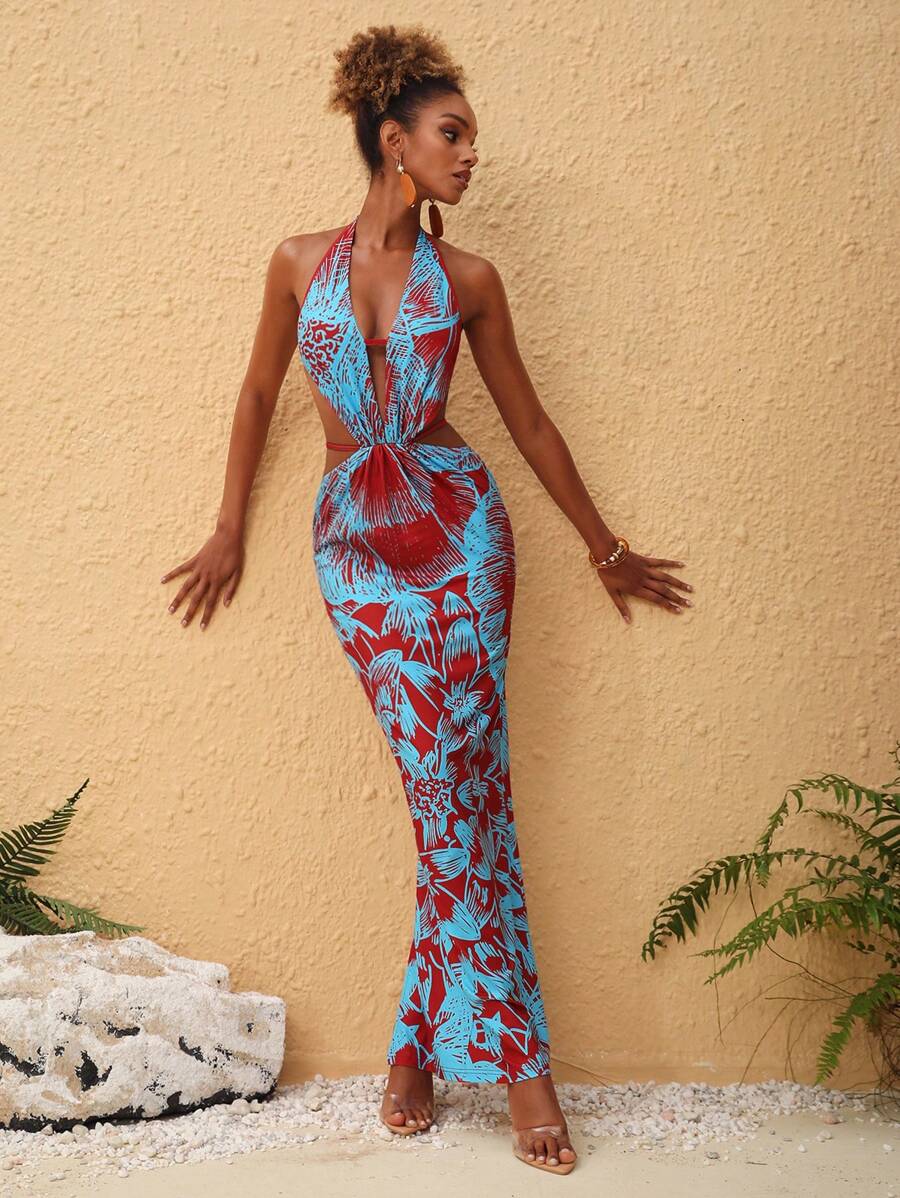 Turn heads this summer with our Vibrant Multicolor Tropical Print Halter Sundress. The lively tropical pattern paired with a flirty halter neckline creates a fun, boho vibe perfect for sunny days and beach adventures. Lightweight and breezy, it keeps you cool while adding a burst of color to your wardrobe. Embrace effortless style and playful charm wherever your summer takes you!