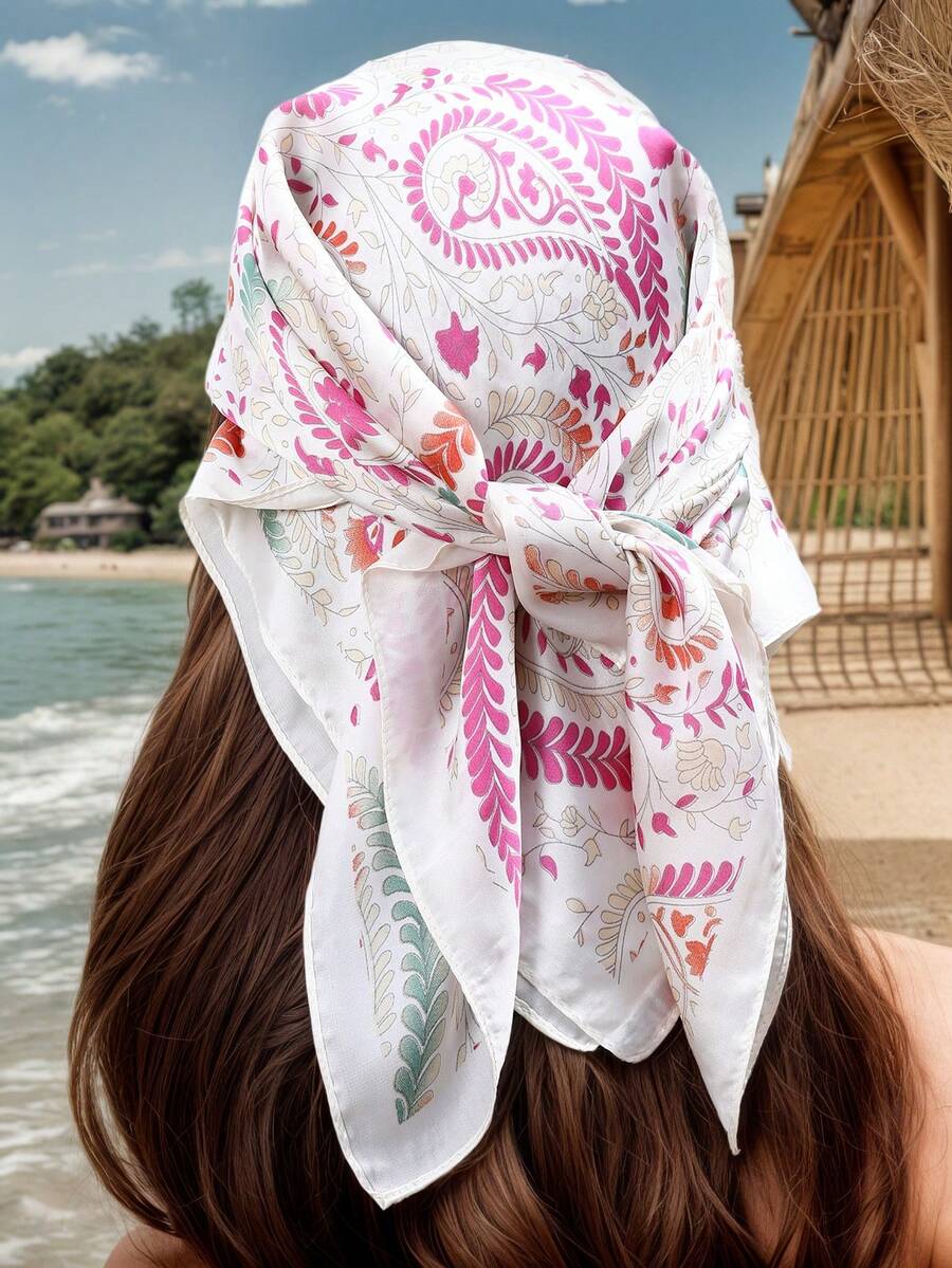Elevate your accessory game with this stunning Vibrant Paisley Printed Satin Scarf. Crafted from luxurious 100% polyester satin, this versatile piece features an eye-catching multicolor paisley design that effortlessly transitions across all seasons. Perfect for boho-inspired styling, wear it as a hair accessory with a simple knot or tie, or drape it for endless looks. The smooth satin finish adds a touch of elegance while the vibrant paisley pattern brings personality to any outfit. 