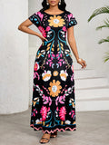Get ready to turn heads with this Vibrant Printed Dress! Designed with a round neck and short sleeves, this dress is perfect for any occasion. From a casual day out to a special event, this dress will have you looking stylish and confident. Don't miss out on this must-have addition to your wardrobe!