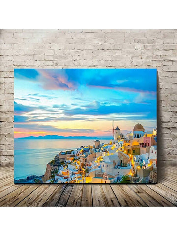 Bring the warmth of a Mediterranean escape into your home with this stunning Santorini sunset canvas art. Featuring vibrant hues of orange, pink, and gold reflecting across calm ocean waters, this piece captures the serene beauty of Greece's most iconic destination. Perfect for modern, coastal, or eclectic interiors, the framed canvas arrives ready to hang—no additional setup required. The high-quality print on premium canvas ensures lasting color vibrancy and durability. 