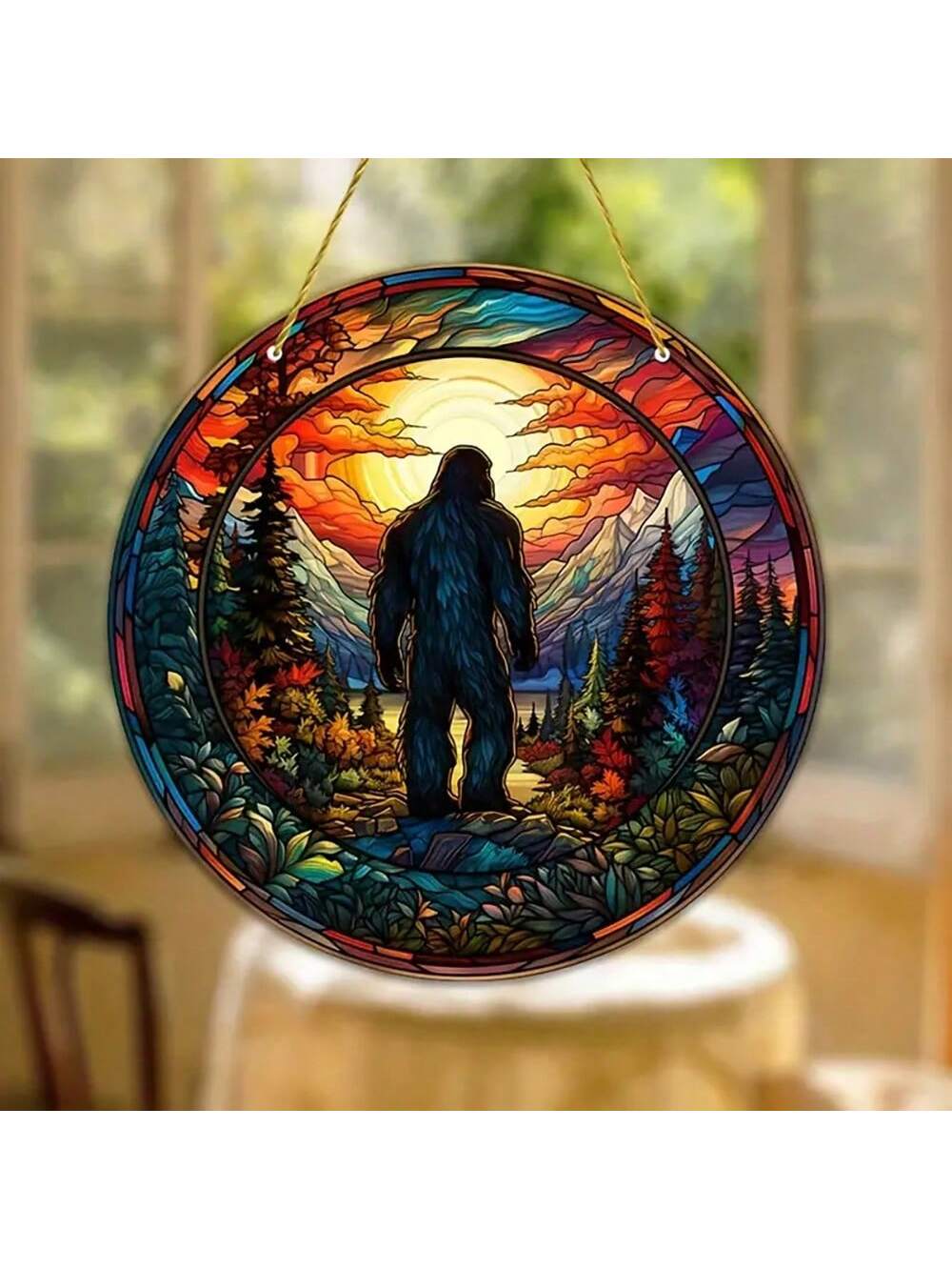 Elevate your home decor with our Vibrant Sasquatch Window Hanging Ornament. With its vivid colors and unique design, this ornament is sure to add a touch of personality to any window. Bring the beauty of nature inside and make a statement with this eye-catching piece.