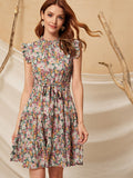 Elevate your vacation wardrobe with our Vibrant Vacation: Floral Print Ruffle Hem Belted Dress. The vibrant floral print and flattering ruffle hem add a touch of femininity, while the belted waist cinches your figure for a stunning silhouette. Perfect for a day at the beach or a night out on the town.