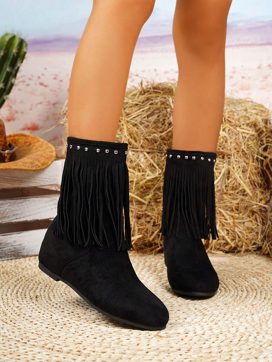 Step out in style with these vintage-inspired brown faux suede ankle boots, featuring playful fringe and a stylish buckle design. Perfect for casual outdoor adventures, they bring a fun twist to any outfit while keeping your feet comfy and cool. Add a bit of retro charm to your look and let your personality shine with every step!