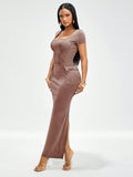 Step into timeless charm with this vintage-inspired brown fitted midi dress. Its flattering silhouette hugs your curves while offering everyday comfort, making it perfect for casual outings or special occasions. The warm brown hue brings a cozy, classic vibe to your wardrobe, ensuring you feel effortlessly elegant with a playful twist.