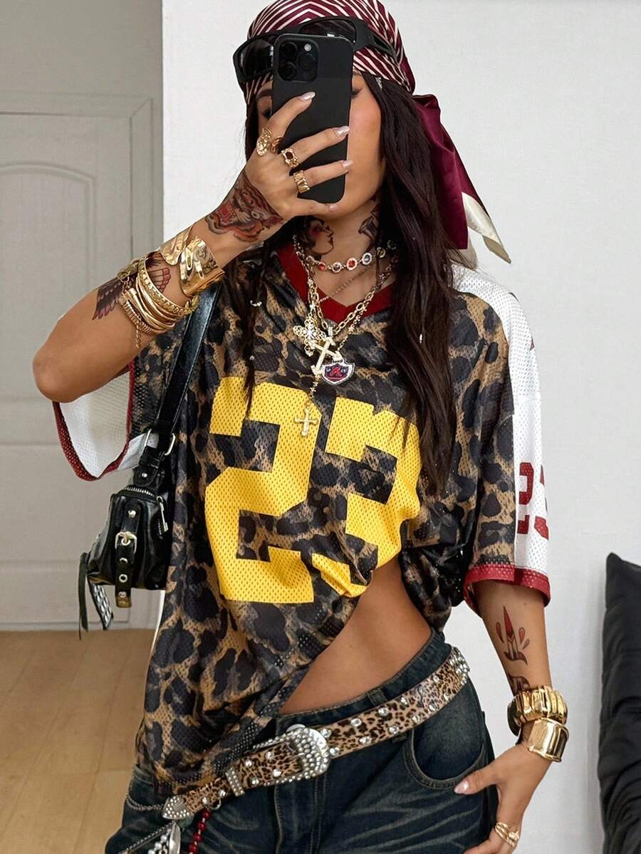 Front view of white leopard oversized baseball jersey T-shirt with gold 23 graphic