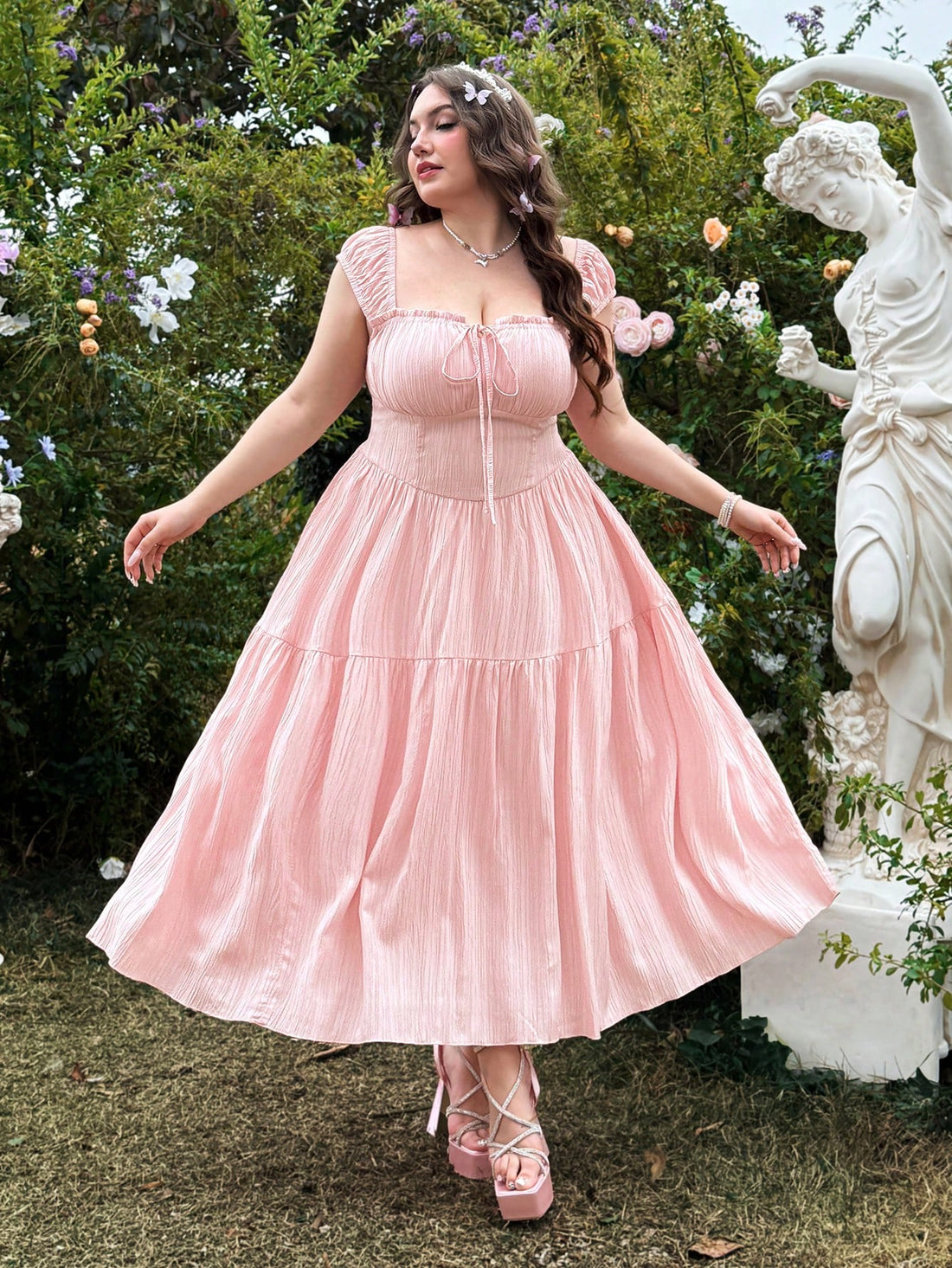 Get ready to add a touch of vintage charm to your casual spring and summer outings with this plus size pink dress! With its vintage-inspired design and comfortable fit, you'll feel both stylish and confident. Perfect for any occasion, this dress is a must-have for any fashion-savvy individual.