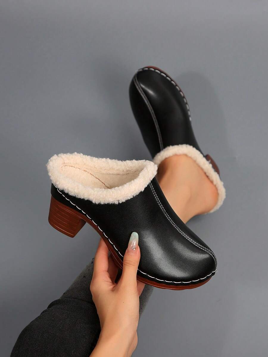 Step into comfort without sacrificing style! These vintage-inspired mule slippers blend retro charm with modern coziness. Featuring a plush faux fur lining, durable leather upper, and a sturdy chunky heel, they're perfect for lounging at home or running errands in effortless elegance. The slip-on design means zero fuss—just slide them on and go. Whether you're channeling 70s vibes or simply craving all-day comfort, these slippers deliver both nostalgia and practicality in one fabulous package.
