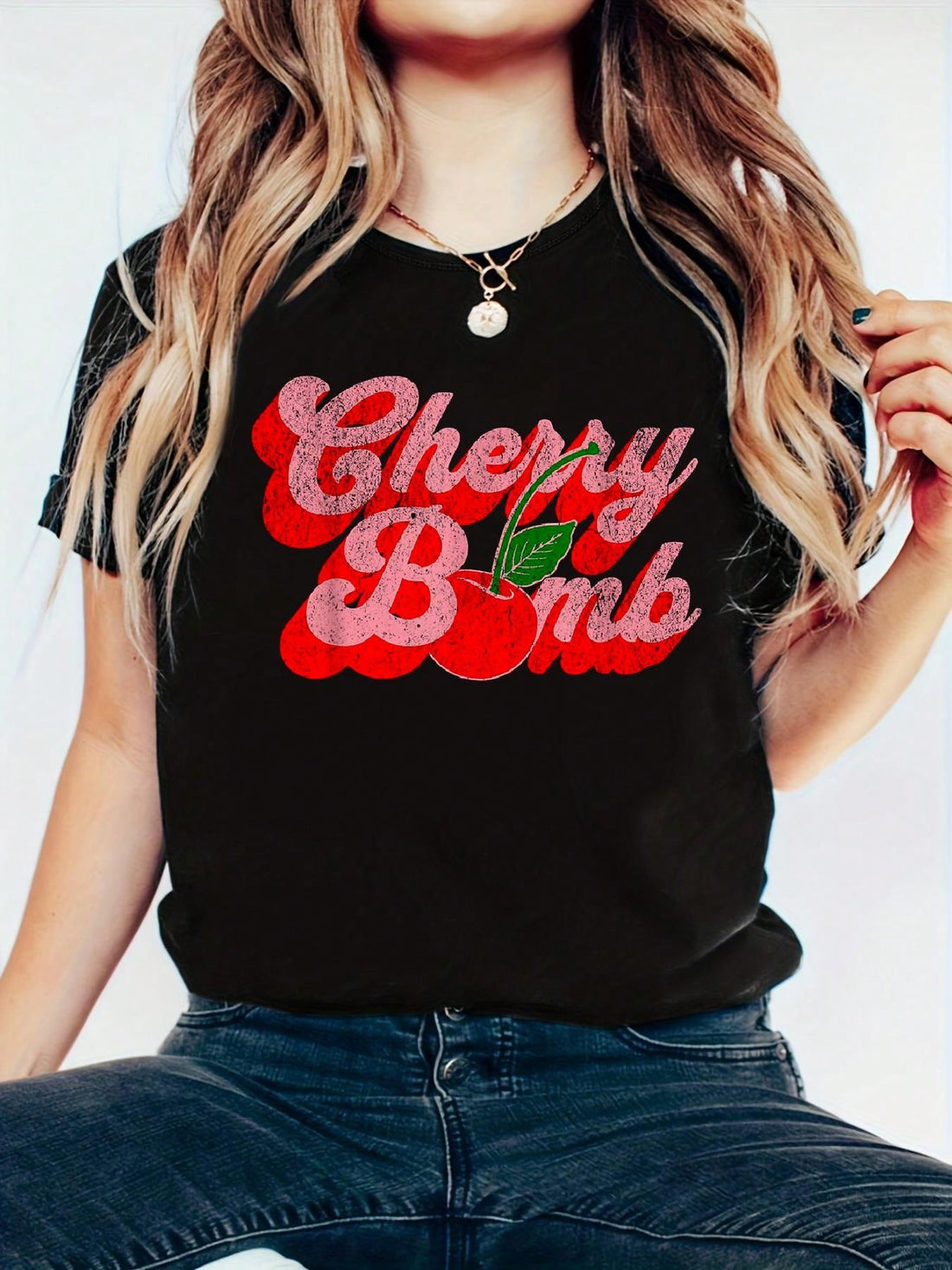 Looking for a fun and unique addition to your wardrobe? Look no further than our Vintage 70s Cherry Bomb T-Shirt! Made from 100% cotton, this short sleeve top is perfect for summer and spring casual wear. With a cute and comfortable design, you'll be turning heads and feeling great. Available now!