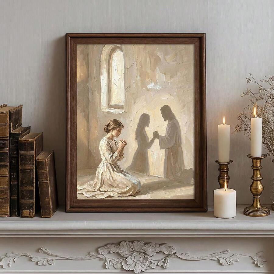 Framed Christian canvas painting of a kneeling woman praying with Jesus and a woman in a softly lit church