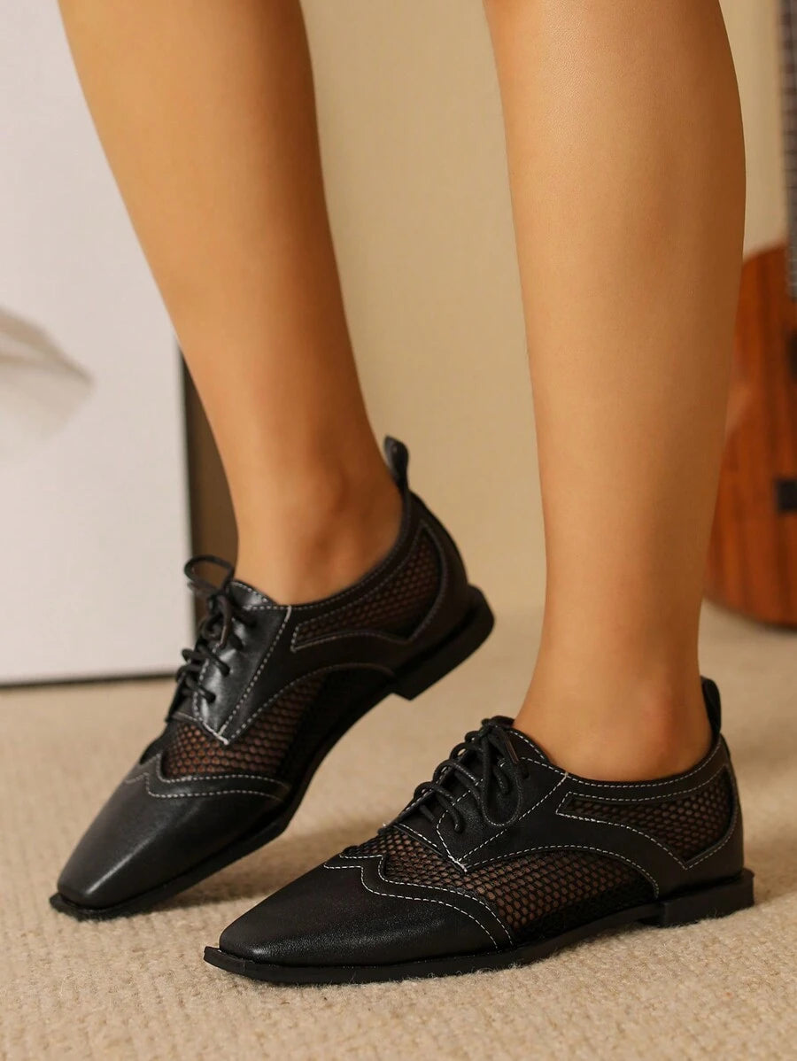 Step out with charm and confidence in these Vintage British Style Lace-Up Black Block Heel Flats. Their timeless lace-up design combined with a sturdy block heel brings a touch of old-school elegance to any outfit. Perfect for dancing through your day, these shoes offer both style and comfort with a playful nod to classic fashion.