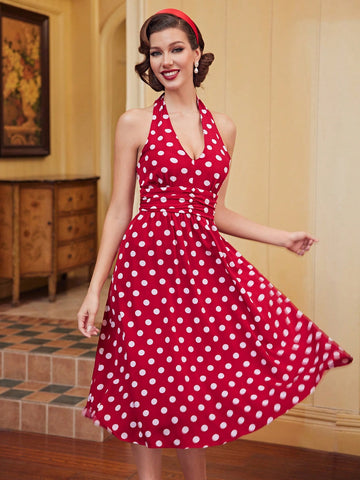 Turn heads in our Vintage Charm Dress – featuring a ruched front, playful polka dots, a halter neck, and a backless design. This summer dress adds charm and style to any occasion. (But don't just take our word for it, try it for yourself! 😉)