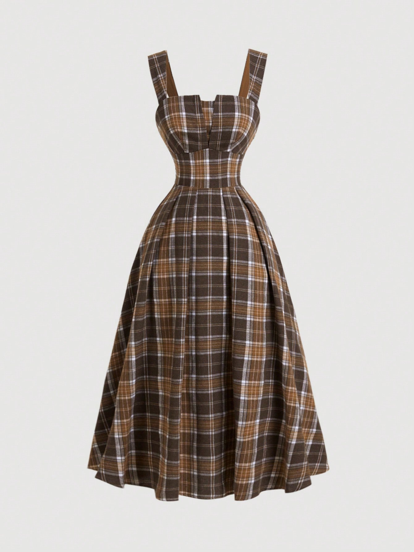 Elevate your fall wardrobe with our Vintage Chic Plaid Slip Dress. This stylish and versatile dress is the perfect addition for the season, and with its classic plaid design, it's also perfect for Halloween festivities. Made with high-quality materials, it's the perfect blend of comfort and style. Order now and stand out with a timeless look.