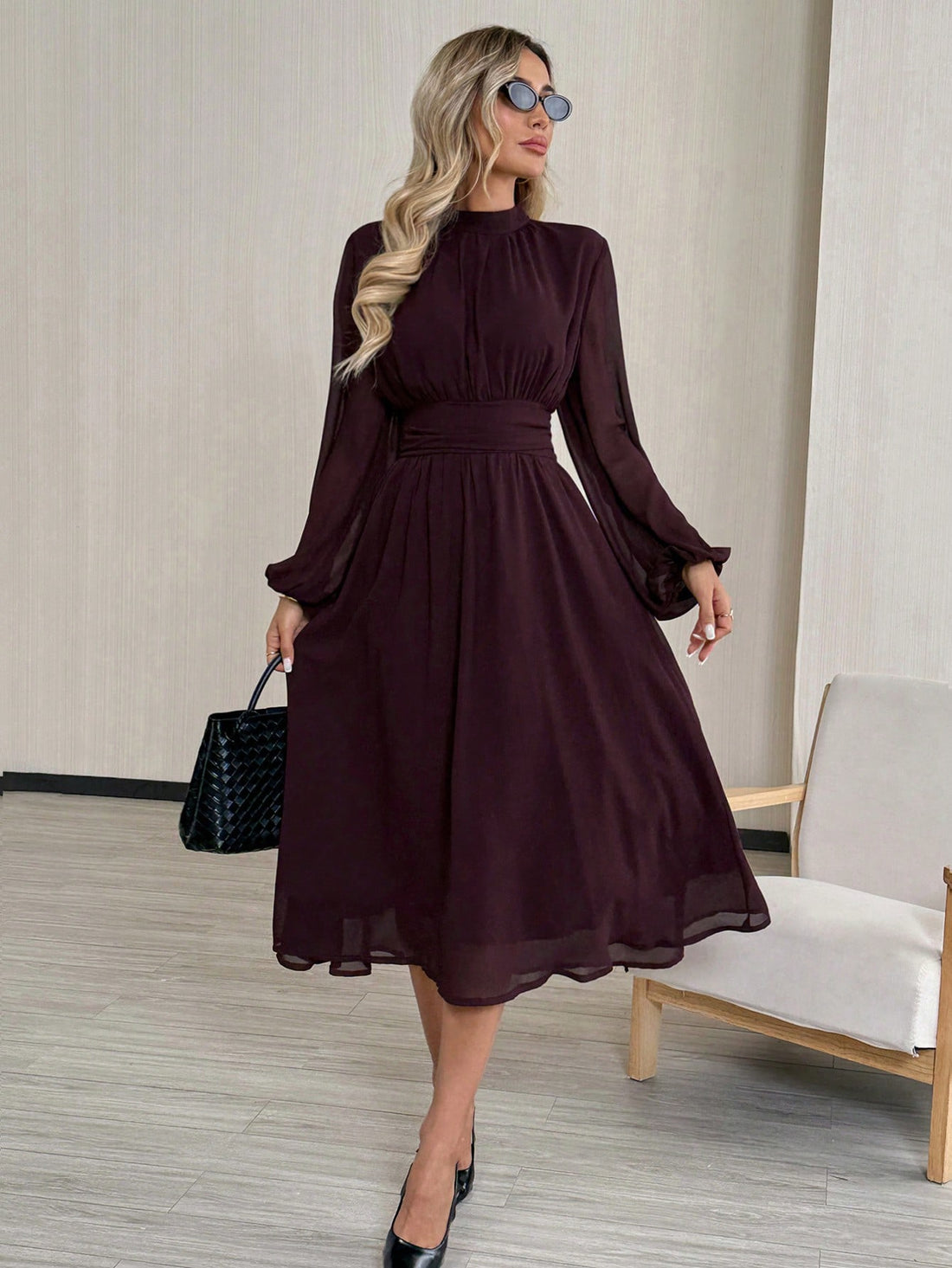 Step into autumn with effortless sophistication in this stunning chocolate brown maxi dress. The flattering A-line silhouette skims your curves beautifully, while charming lantern sleeves add a touch of vintage flair and movement. Perfect for transitioning from office meetings to weekend adventures, this versatile piece layers seamlessly under blazers or stands alone as a statement look. Rich, warm tones complement every skin tone, making it your go-to dress when you want to look polished without trying too