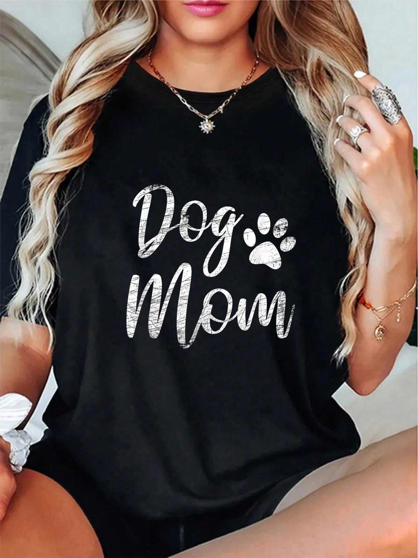 Get ready to rock this Vintage Cotton 'Dog Mom' Classic Tee! Not just your average t-shirt, this one features a fun & stylish paw print design that is sure to turn heads. Comfortable and made with high-quality vintage cotton, this tee is perfect for all the dog moms out there.