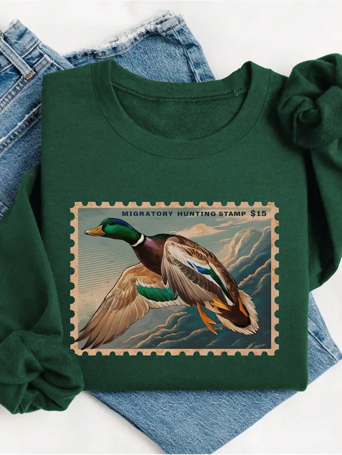 Stay cozy and chic with our Vintage Duck Flight Thermal-Lined Sweatshirt. With its unique postage stamp design, you'll stand out while staying warm with its thermal lining. Perfect for a quirky and playful fashion statement.