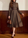 Step into cozy charm with this vintage-inspired 2-in-1 dress, blending wool knit and patchwork for a unique look. Featuring handy pockets and a casual silhouette, it’s perfect for autumn commutes or weekend adventures. Enjoy warmth, style, and practicality all wrapped into one effortlessly playful outfit.