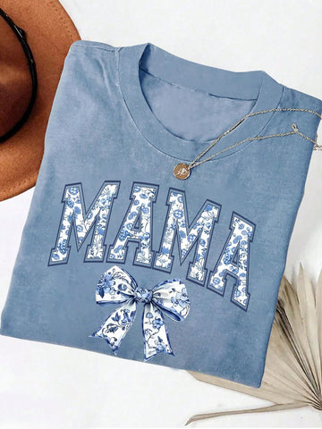 Add a pop of retro style to your wardrobe with our Vintage Floral Print T-Shirt. This playful tee features a charming bowknot accent and a fun floral print, perfect for channeling your inner "retro mommy".